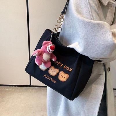 Tas tangan warna putih hitam dengan lapisan kain yang dapat disesuaikan